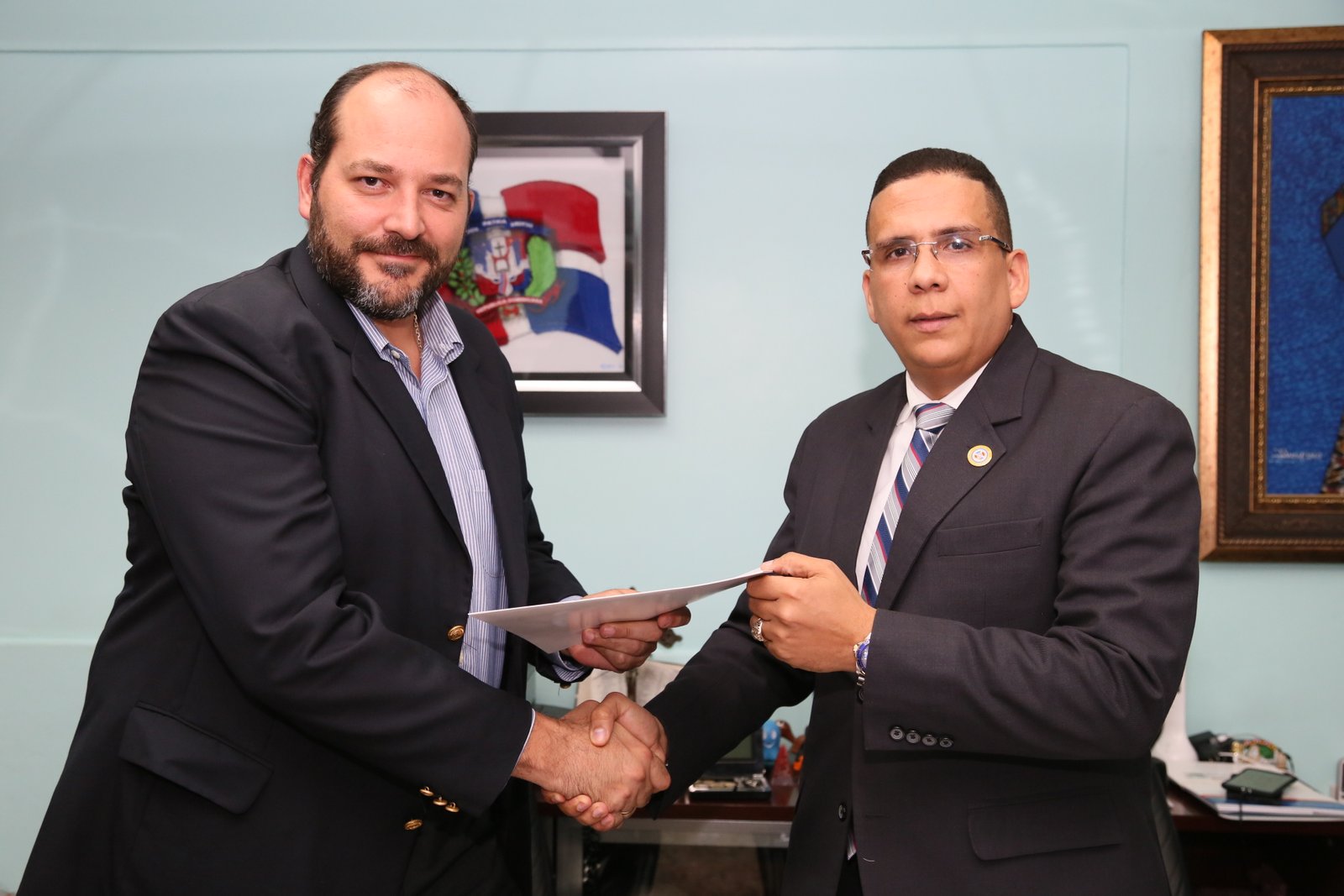 Ernesto Alegrett gerente general de Corotos y Licurgo Yunes director DICAT